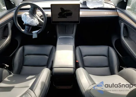 2023 Tesla Model Y from USA, damaged, VIN 7SAYGDED0PF945725